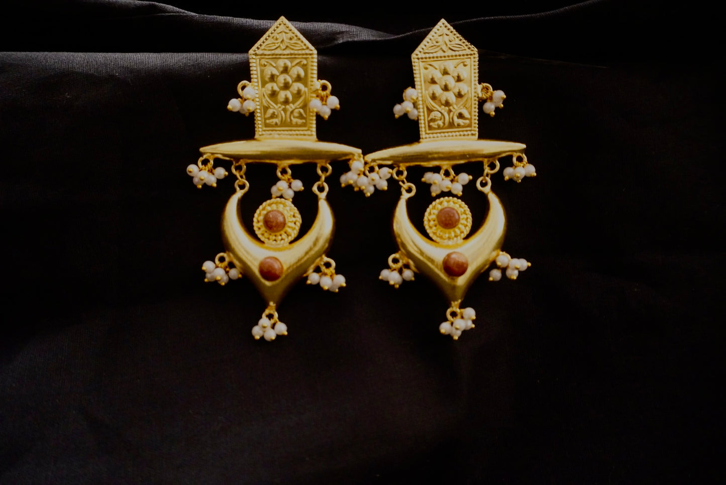 Brass earrings with red stone